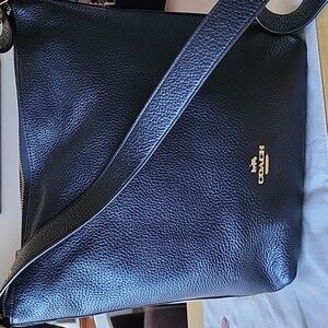Make a reasonable offer. Coach Black Pebble Val Duffle Shoulder/Crossbody